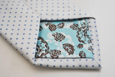 white tie with light blue pin spots